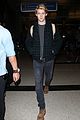 joe alwyn lands in los angeles in time for new years day 32