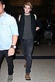 joe alwyn lands in los angeles in time for new years day 40