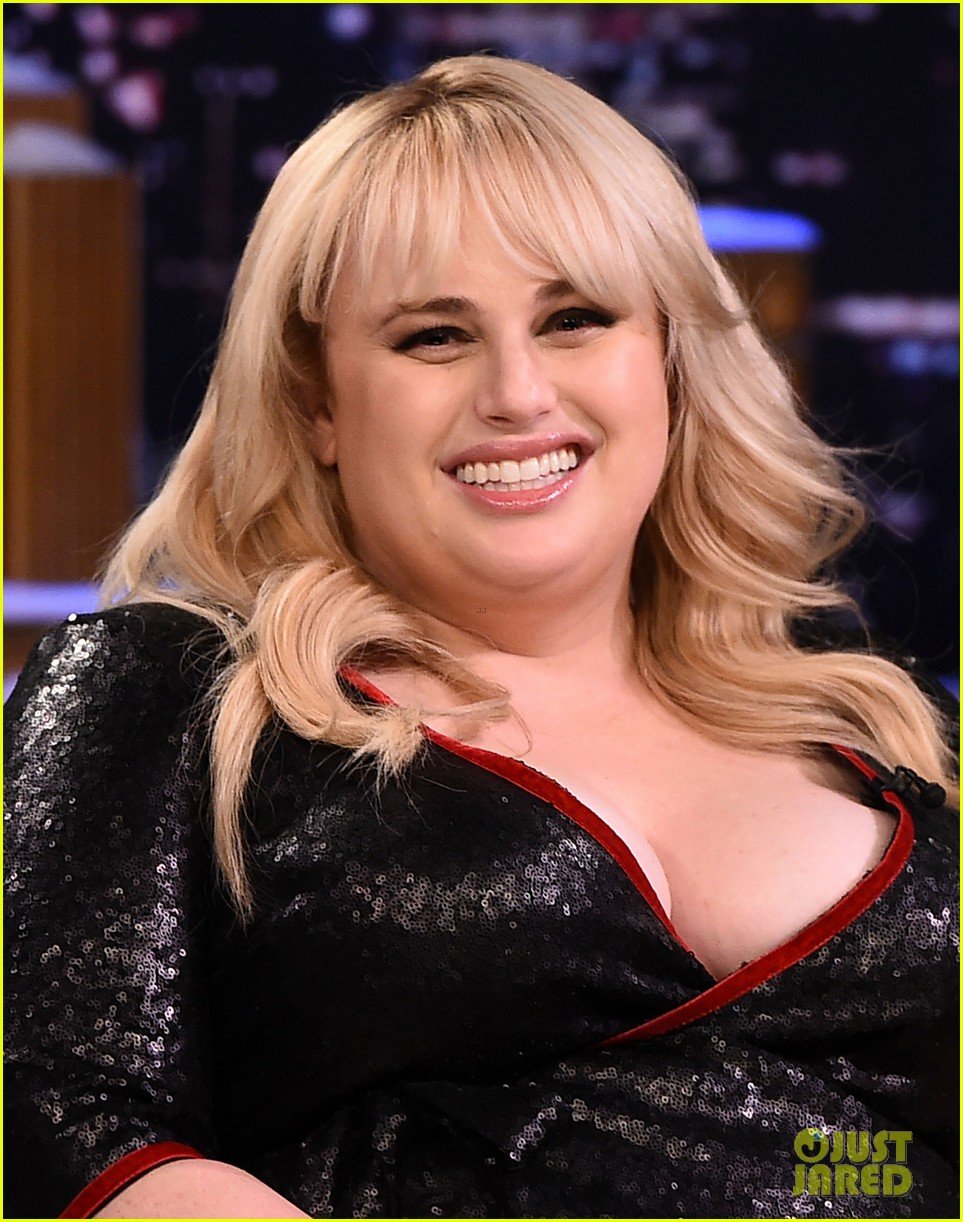 Rebel Wilson belts out a new holiday tune while making an appearance on The...