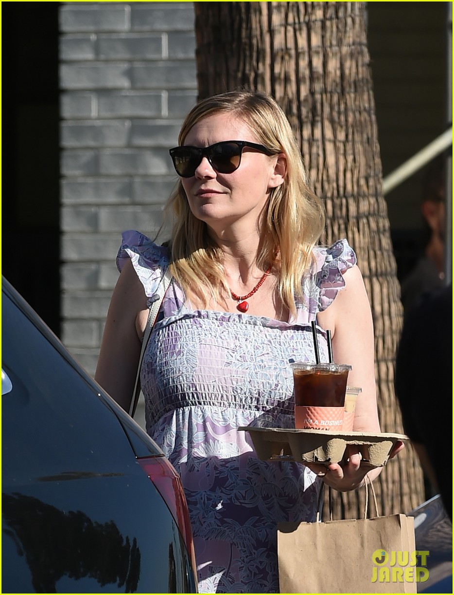 Pregnant Kirsten Dunst Covers Up Baby Bump in Purple Maxi Dress Photo