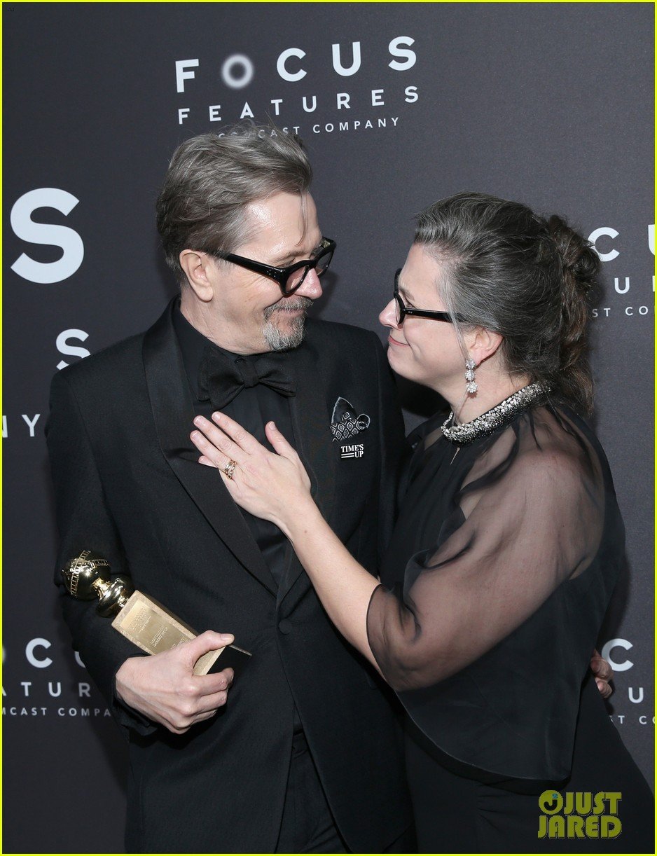 Gary Oldman and Wife Gisele Share a Kiss