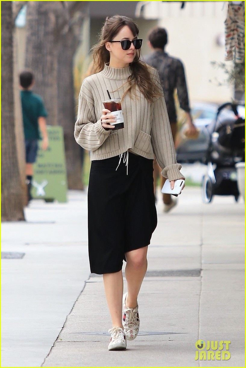 Photo: dakota johnson keeps it comfy and chic in beige sweater for