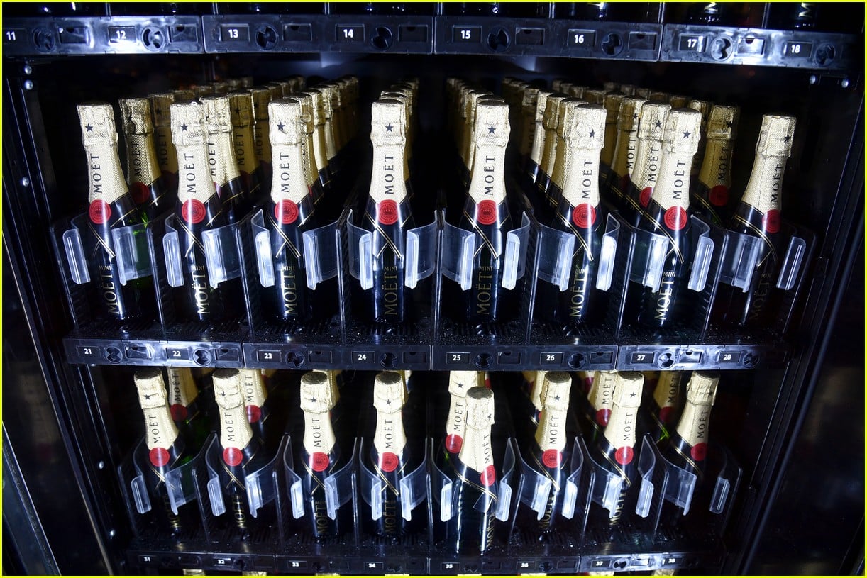 Chrissy Teigen Gifts Kris Jenner a Champagne Vending Machne! Photo