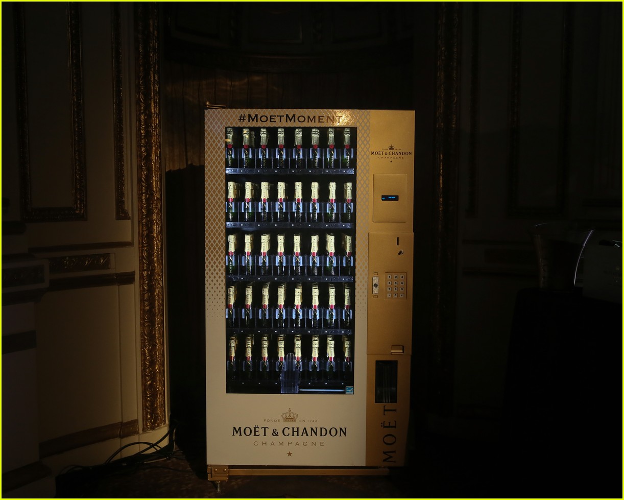 Chrissy Teigen Gifts Kris Jenner a Champagne Vending Machne! Photo