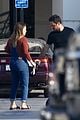 hilary duff dresses baby bump in overalls 03