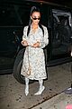 kim kardashian wears dollar bill covered coat and boots while out with kylie jenner01
