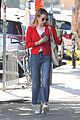 emma roberts rocks a red cardigan for her smoothie run03