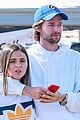 patrick schwarzenegger wraps arms around friend while out with maria and christina05