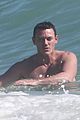 luke evans bares hot body in tiny speedo on vacation in mexico 17