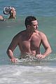luke evans bares hot body in tiny speedo on vacation in mexico 21