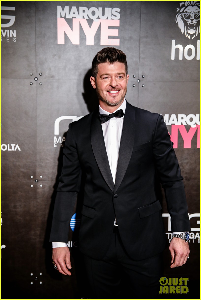Lindsay Lohan & Robin Thicke Attend Marriott Marquis' New Year's Eve