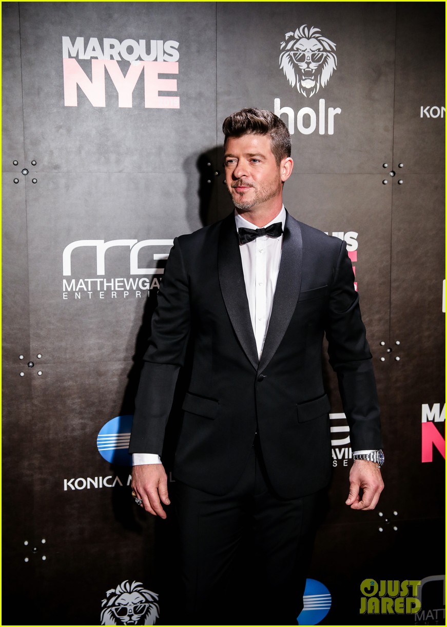 Lindsay Lohan & Robin Thicke Attend Marriott Marquis' New Year's Eve