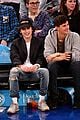 timothee chalamet spills his drink at new york knicks game 01