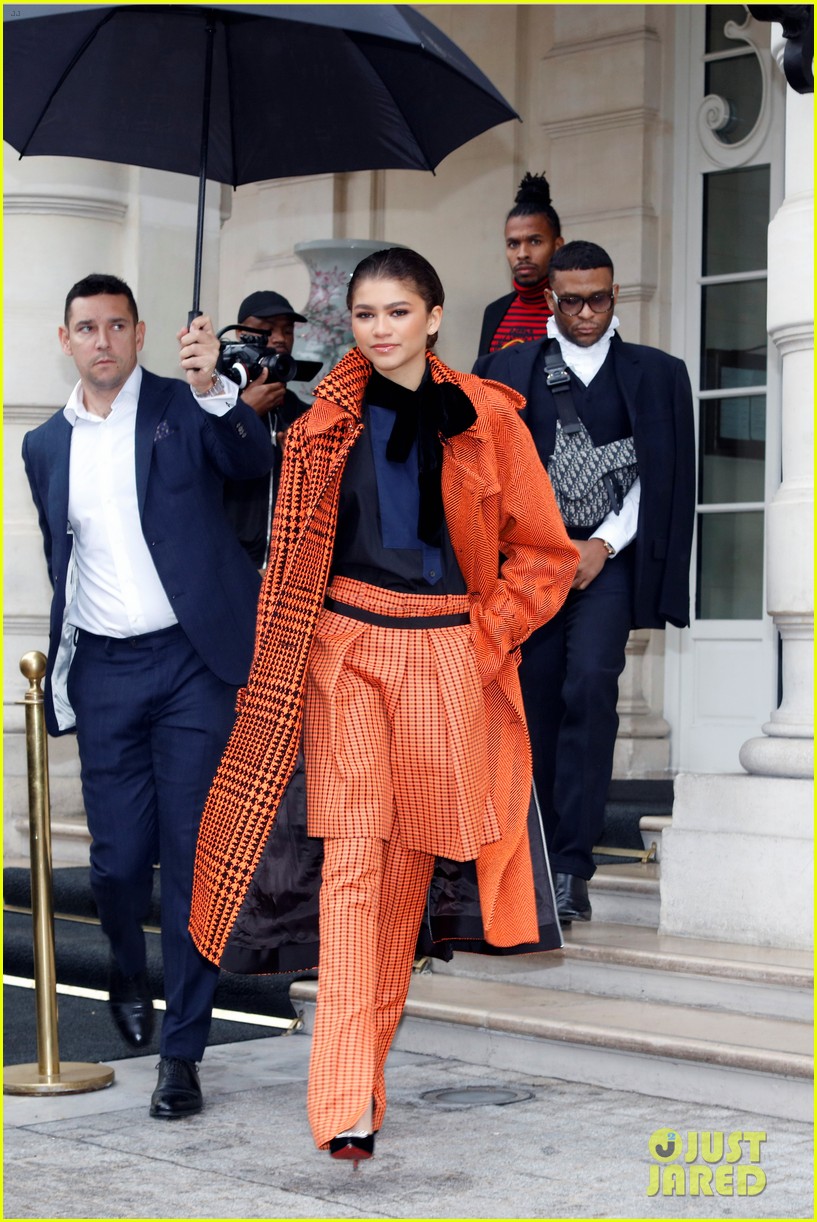 Zendaya Pops in Orange While Out During Paris Fashion Week: Photo