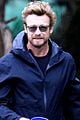 simon baker plays fetch with his dog in sydney 02