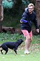 simon baker plays fetch with his dog in sydney 03