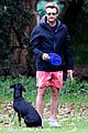 simon baker plays fetch with his dog in sydney 05