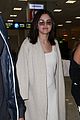 selena gomez arrives at airport for cannes 06