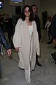 selena gomez arrives at airport for cannes 14