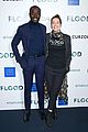 lena headey and ivanno jeremiah hug it out at the flood screening in london 02