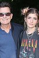charlie sheen with daughters at billie eilish concert 02