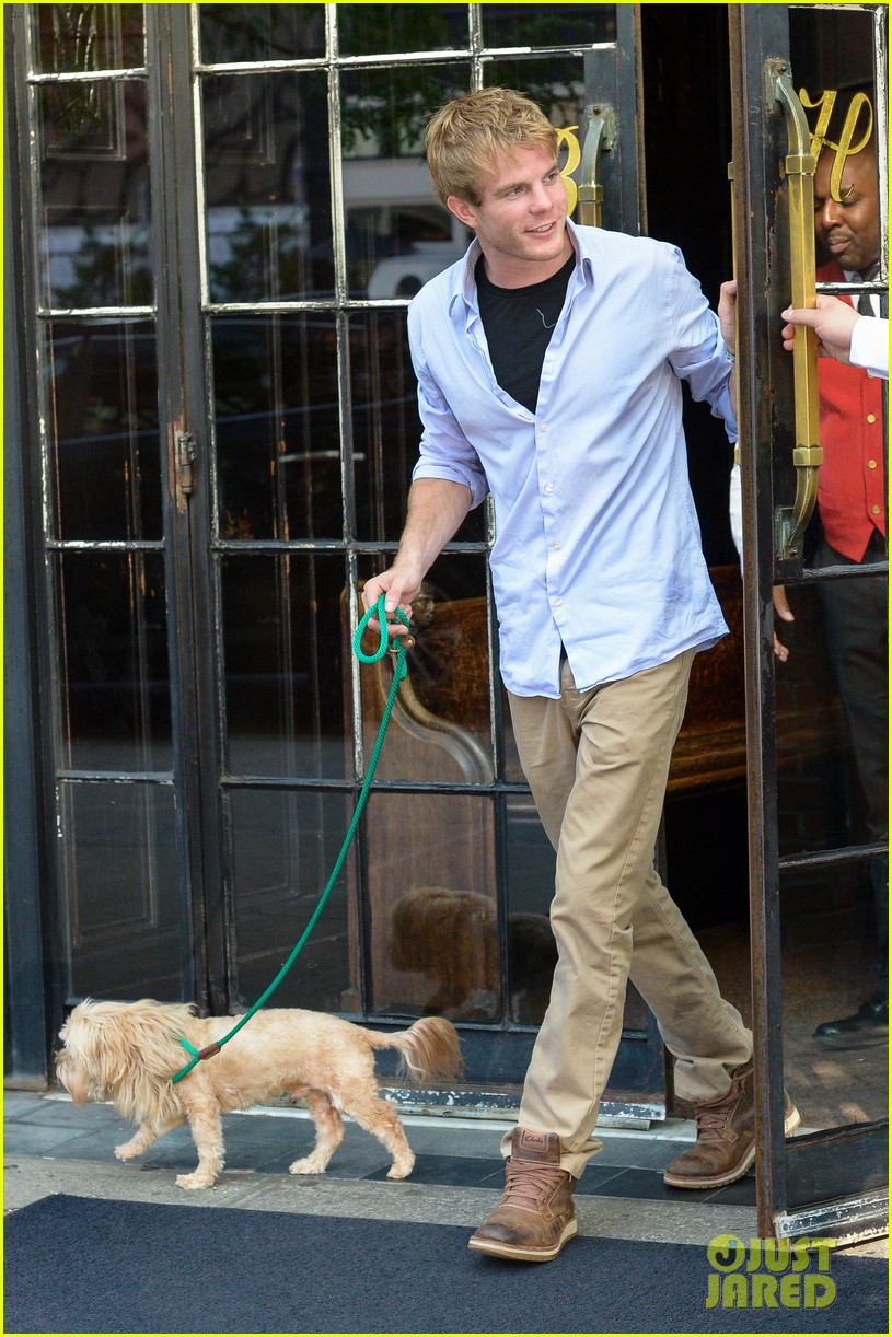 graham rogers takes dog for a walk 034337831