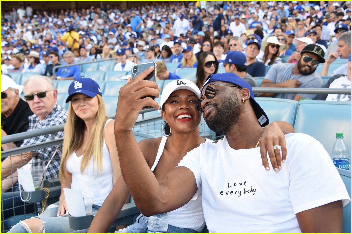 Photo: elizabeth olsen jamie bell gabrielle union enjoy dodgers game 03
