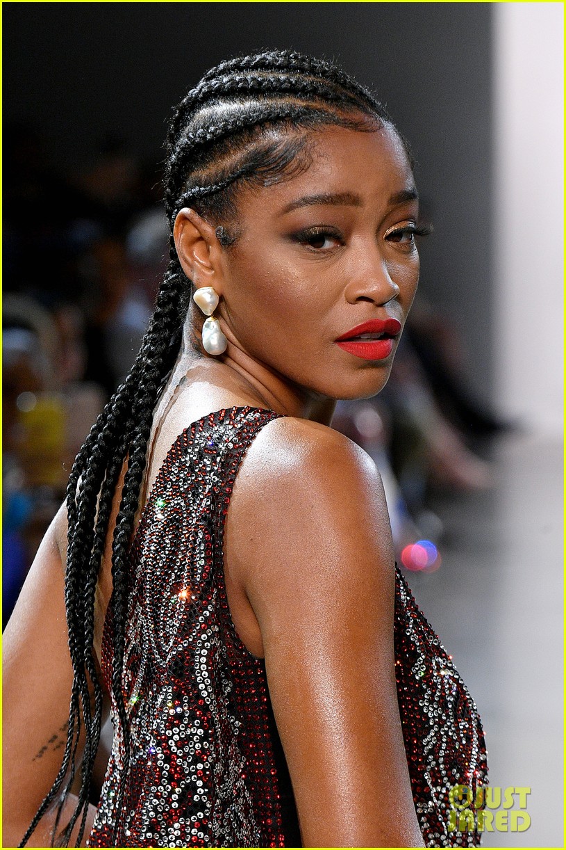 Meghan Trainor Carries Giant Bow Purse to Christian Cowan Show During