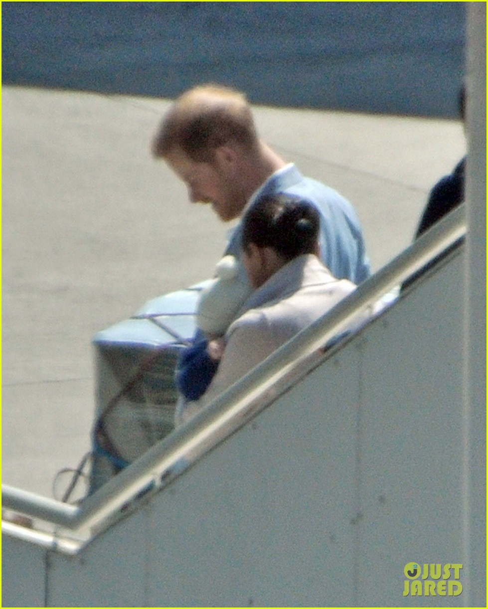 Prince Harry, Meghan Markle, & Baby Archie Arrive in South Africa, Kick