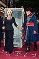 helen mirren gets carried in on a cart for catherine the great premiere 04