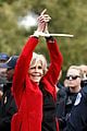jane fonda accepts award while being arrested 01