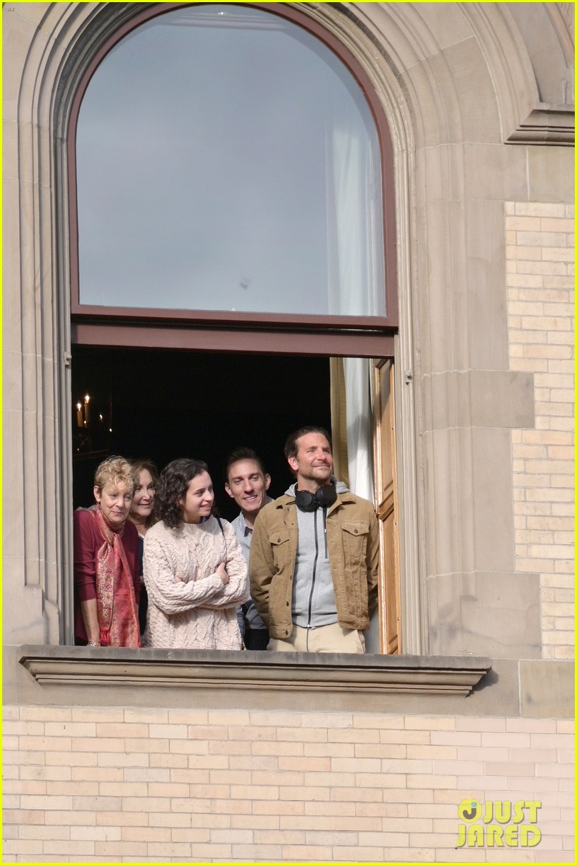 Bradley Cooper Watches the Macy's Thanksgiving Day Parade From a Window