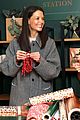 katie holmes brings holiday cheer at frederick wildman wines wrappy hour 10