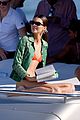 kendall jenner wears tiny orange bikini reading on boat 07