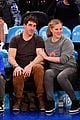 amy schumer husband chris fischer have date night at knicks game in nyc 03