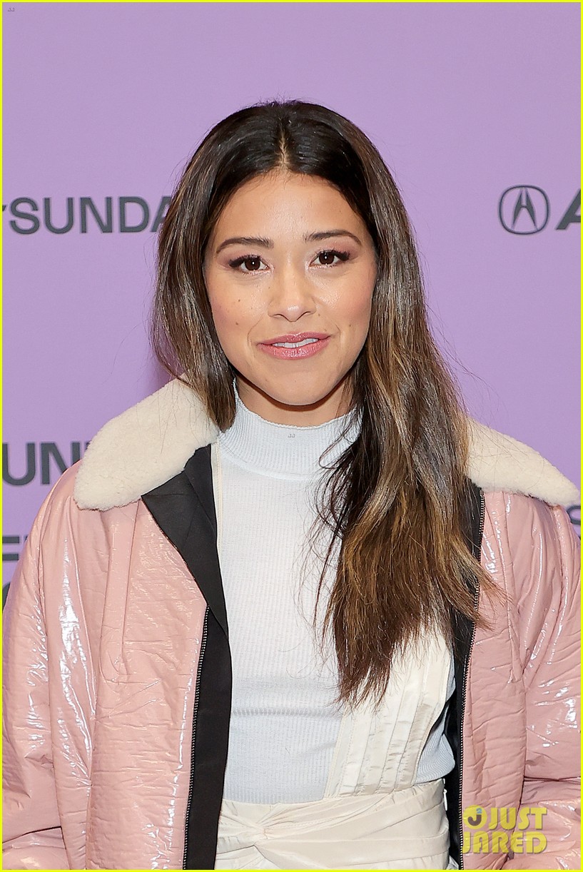 Gina Rodriguez Flexes Her Muscles at 'Kajillionaire' Premiere with Evan