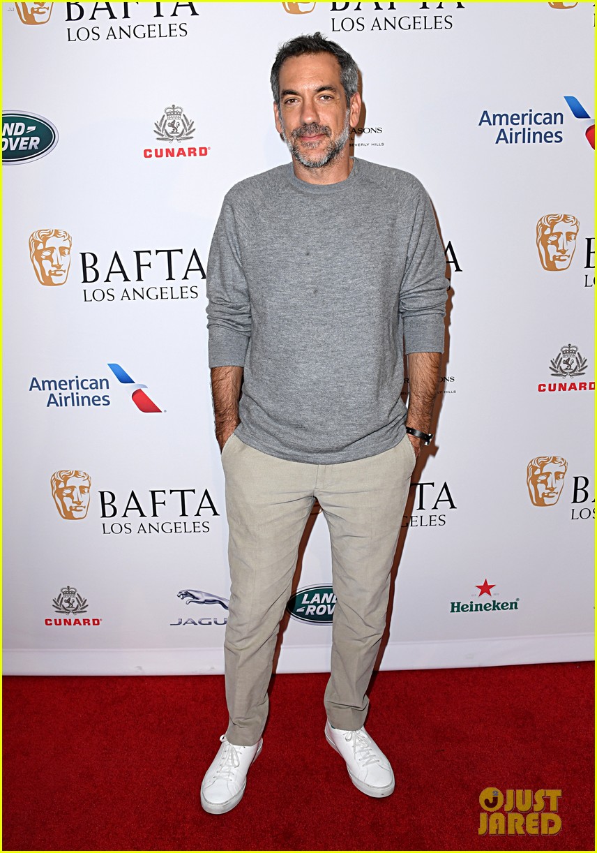 Isla Fisher & Sacha Baron Cohen Hold Hands While Arriving at BAFTA Tea