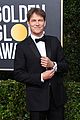 anna paquin floral look golden globes 2020 stephen moyer 02