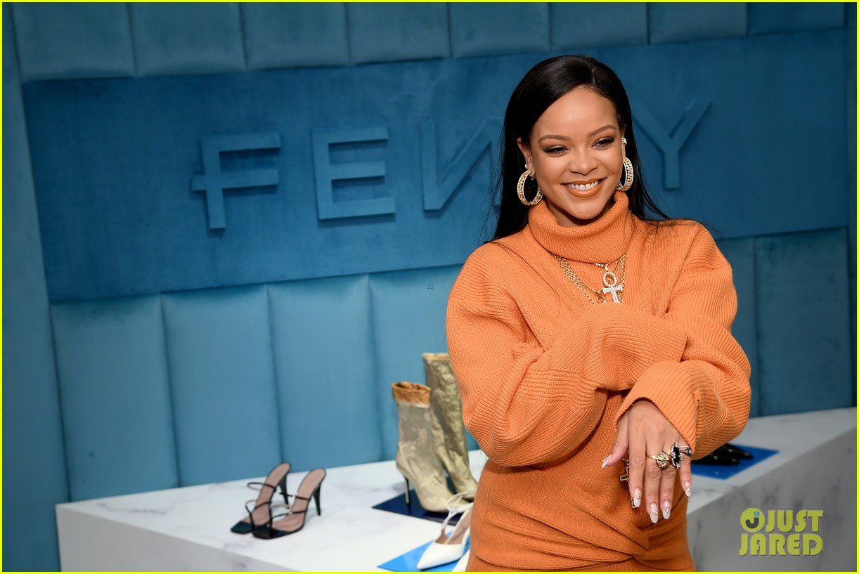 Rihanna Stuns in All Orange For Bergdorf Goodman Digital Window