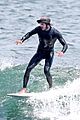 adam brody goes surfing in his wetsuit 03