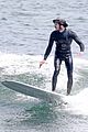 adam brody goes surfing in his wetsuit 08
