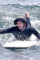 adam brody goes surfing in his wetsuit 09