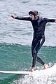 adam brody goes surfing in his wetsuit 10