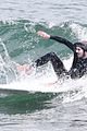 adam brody goes surfing in his wetsuit 15