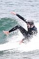 adam brody goes surfing in his wetsuit 16