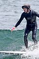 adam brody goes surfing in his wetsuit 18