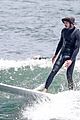 adam brody goes surfing in his wetsuit 21