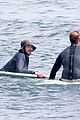 adam brody goes surfing in his wetsuit 23