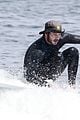 adam brody goes surfing in his wetsuit 27