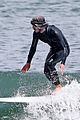 adam brody goes surfing in his wetsuit 28
